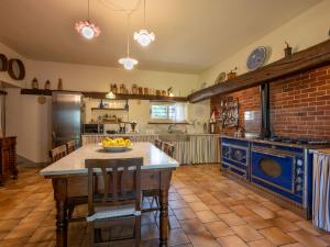 A kitchen or kitchenette at Holiday Home Marmorito by Interhome Még 26 kép