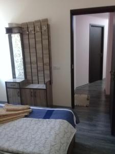 Postel nebo postele na pokoji v ubytování Apartment Giorgi in Sighnaghi