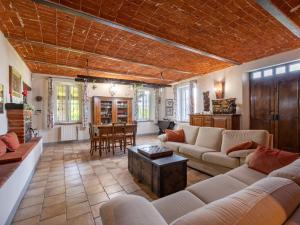 A seating area at Holiday Home Marmorito by Interhome