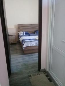 Postel nebo postele na pokoji v ubytování Apartment Giorgi in Sighnaghi