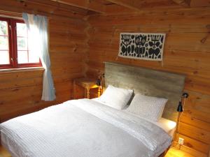 Säng eller sängar i ett rum på Holiday Home Kvila - SOW085 by Interhome