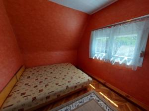 Posteľ alebo postele v izbe v ubytovaní Holiday Home Violett - MAF120 by Interhome