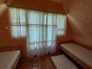 Posteľ alebo postele v izbe v ubytovaní Holiday Home Violett by Interhome