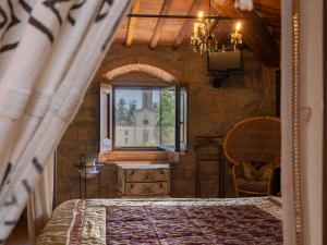 Tempat tidur dalam kamar di Holiday Home Le Buche by Interhome