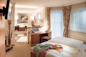 Posteľ alebo postele v izbe v ubytovaní Appartements Lüftenegger