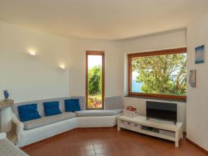 Μια τηλεόραση ή/και κέντρο ψυχαγωγίας στο Holiday Home Sa Murta by Interhome