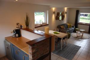 Kuchyň nebo kuchyňský kout v ubytování Appartement Fleurs des champs - Esc'Appart