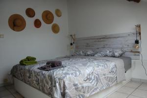 Postel nebo postele na pokoji v ubytování Appartement Fleurs des champs - Esc'Appart