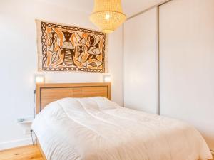 Ένα ή περισσότερα κρεβάτια σε δωμάτιο στο Apartment la Pergola-2 by Interhome