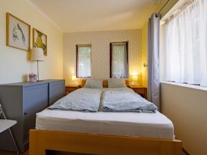 Postel nebo postele na pokoji v ubytování Holiday Home Villa Mediterran by Interhome