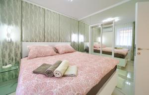 Een bed of bedden in een kamer bij Casa Aurelia - Aurelia Design