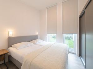 Postel nebo postele na pokoji v ubytování Holiday Home Vakantiehuis Ruisweg 77 by Interhome
