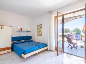 Postel nebo postele na pokoji v ubytování Studio Residenza Agrifoglio-2 by Interhome