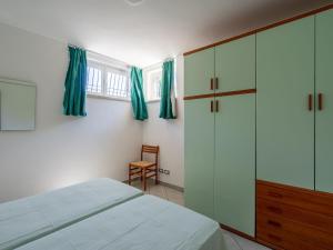Posteľ alebo postele v izbe v ubytovaní Apartment Residenza Agrifoglio-15 by Interhome
