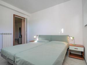 Posteľ alebo postele v izbe v ubytovaní Apartment Residenza Agrifoglio-15 by Interhome