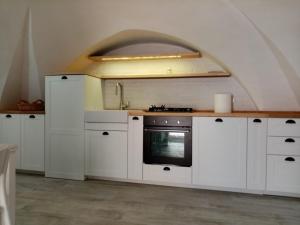 A kitchen or kitchenette at I Nidi di Colombo Még 37 kép