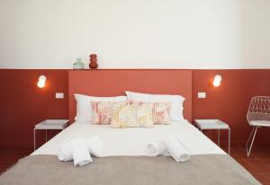 Posteľ alebo postele v izbe v ubytovaní Casa Maja rooms & suites