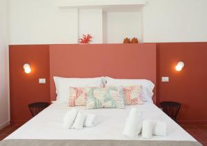 Posteľ alebo postele v izbe v ubytovaní Casa Maja rooms & suites