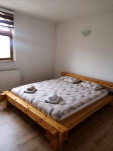 Postel nebo postele na pokoji v ubytování Rooms Delux Sarajevo