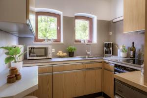 Kuchyň nebo kuchyňský kout v ubytování schaus Lüftenegger Ferienhaus