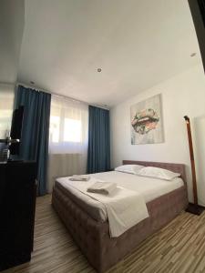 Postel nebo postele na pokoji v ubytování Portobello