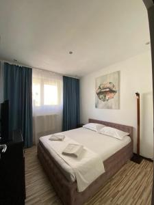 Postel nebo postele na pokoji v ubytování Portobello