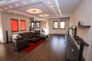 Et opholdsområde på Apartments Malkoc Lux