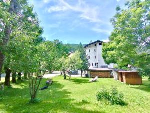 Vrt pred nastanitvijo Hotel B&B Lorenzini Ski