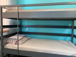 a bunk bed in a room with a bunk bed gmaxwell gmaxwell gmaxwell gmaxwell at Lake Sevan Hostel in Sevan