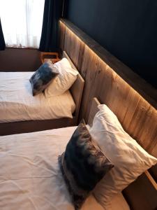 Postel nebo postele na pokoji v ubytování Beaux Temps b&b