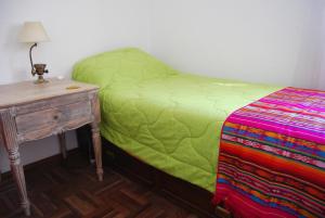 Кровать или кровати в номере Penthouse Duplex en Pocitos
