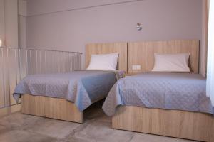 Katil atau katil-katil dalam bilik di Callista Luxury Apartments