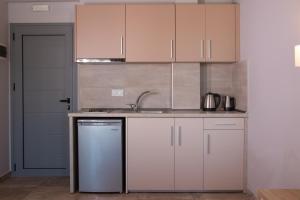 Кухня или кухненски бокс в Callista Luxury Apartments