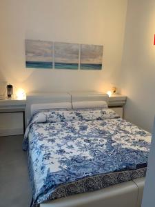 Кровать или кровати в номере Frassinella Benci Palace