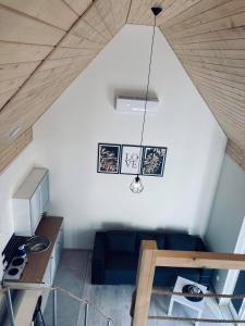 Televízia a/alebo spoločenská miestnosť v ubytovaní Domek letniskowy Sunny House , Nocleg Zator Energylandia