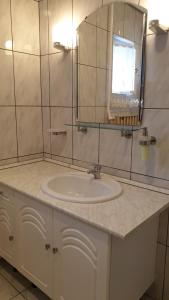 Koupelna v ubytování Ilona apartmanok