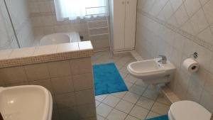 Koupelna v ubytování Ilona apartmanok