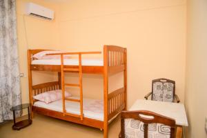 Posteľ alebo postele v izbe v ubytovaní Central Hostel