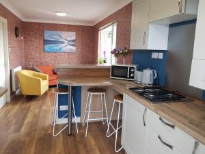 Kuchyň nebo kuchyňský kout v ubytování Skeabostview Brand New Self catering