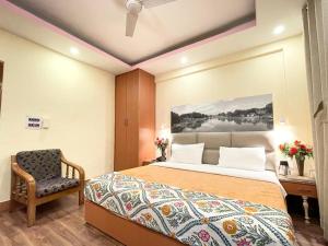 Voodi või voodid majutusasutuse Hotel Centre Point toas