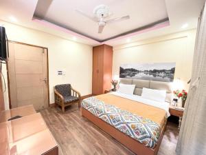 Voodi või voodid majutusasutuse Hotel Centre Point toas