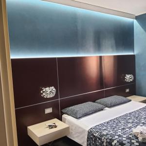 Giường trong phòng chung tại Manu's Guest Suite