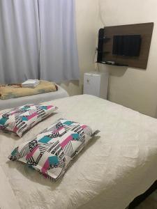 Postel nebo postele na pokoji v ubytování Pousada Pickler