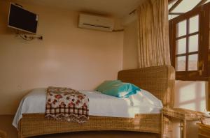 Postel nebo postele na pokoji v ubytování Hostal Poseidon