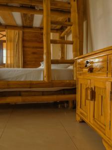 Postel nebo postele na pokoji v ubytování Hostal Poseidon