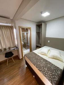Postel nebo postele na pokoji v ubytování Arca's Hotel