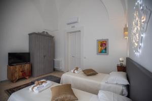 A television and/or entertainment centre at B&B Don Alessandro