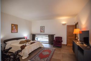 A bed or beds in a room at B&B Don Alessandro