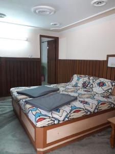 Postel nebo postele na pokoji v ubytování Hotel Rajpal Guest House