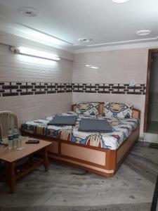 Postel nebo postele na pokoji v ubytování Hotel Rajpal Guest House